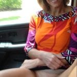 Bare ass blonde in very short black skirt walking black dog out