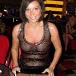 Bottomless Brunette Teases with Pussy Flash