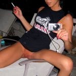 Slutty whore sitting on bench with spread leags