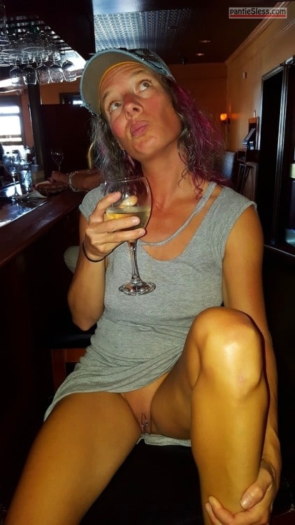 Purple hair MILF drinking wine flashing pussy and thinking about….