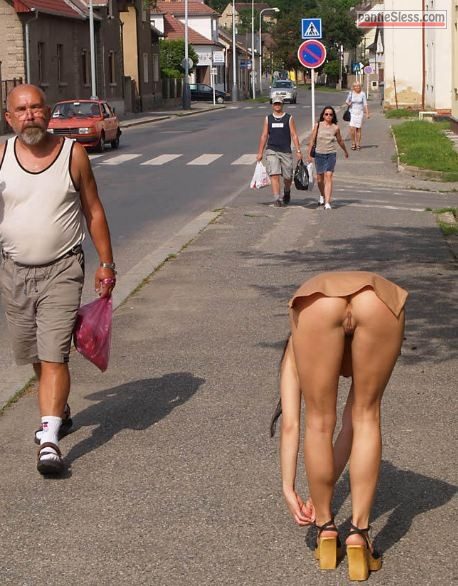Public street intentional bending over no panties