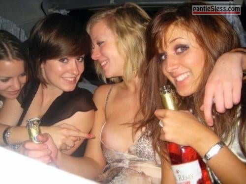 4 drunk chicks drinking on backseat of limo