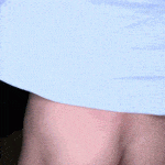 Bare ass blonde in very short black skirt walking black dog out