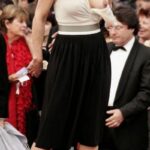 Hotwife wearing short skirt and white panties