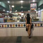 Busty black girl flashing big tits and pussy tan lines at supermarket