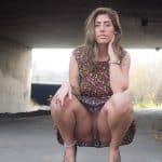 Naughty babe seducing by flashing her pussy