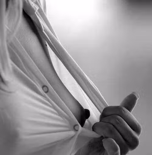 beauty shows her aroused nipple