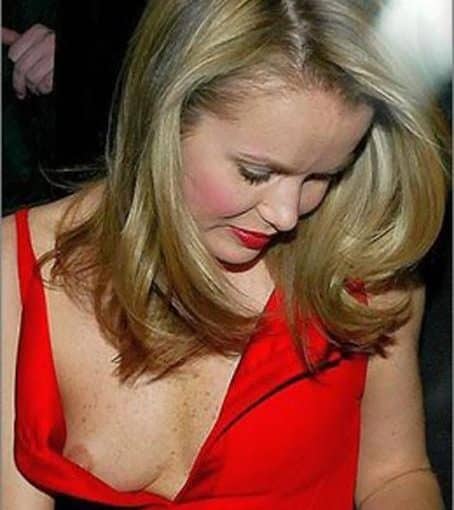blonde in a red dress flashed a tit