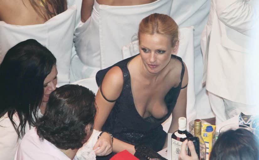 boobs without a bra under a black dress