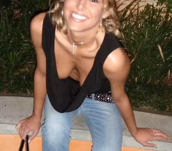 happy blonde is not wearing a bra