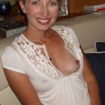 Blonde MILF Flashes Her Shaved Pussy Outdoors in Thong