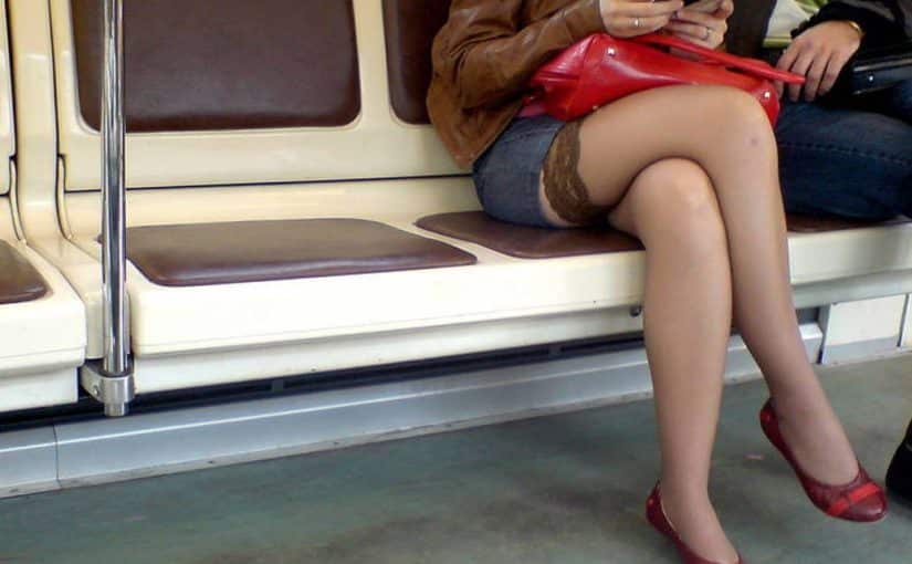 hot blonde in transport does not hide nylon stockings