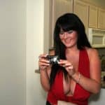 Mature lady happy to take part at nude beach night party