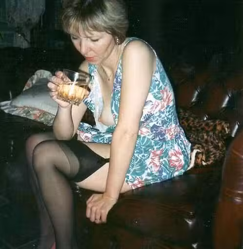 mature mom unbuttoned her dress
