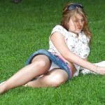 Teenage girl in sexy black outfit with no panties