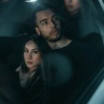 flashing tit at a restaurant table